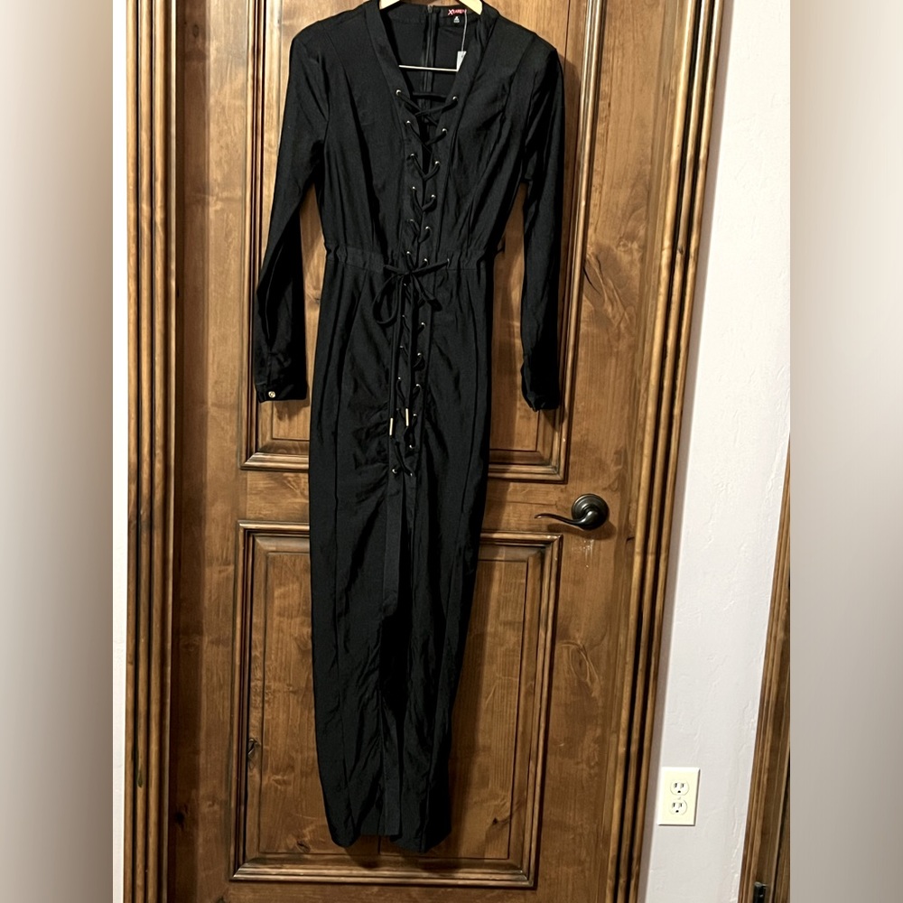 Black dress with criss cross black and gold lace super cool dress never worn